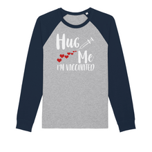 Load image into Gallery viewer, Hug Me I'm Vaccinated Organic Raglan Long Sleeve Shirt