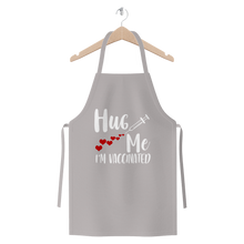 Load image into Gallery viewer, Hug Me I'm Vaccinated Premium Jersey Apron