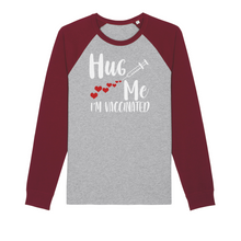 Load image into Gallery viewer, Hug Me I'm Vaccinated Organic Raglan Long Sleeve Shirt