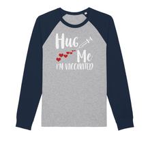 Load image into Gallery viewer, Hug Me I&#39;m Vaccinated Organic Raglan Long Sleeve Shirt
