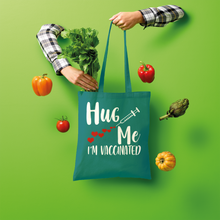 Load image into Gallery viewer, Hug Me I&#39;m Vaccinated Shopper Tote Bag
